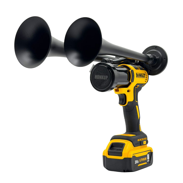 A DeWalt cordless battery powered double horn air compressor with remote control 