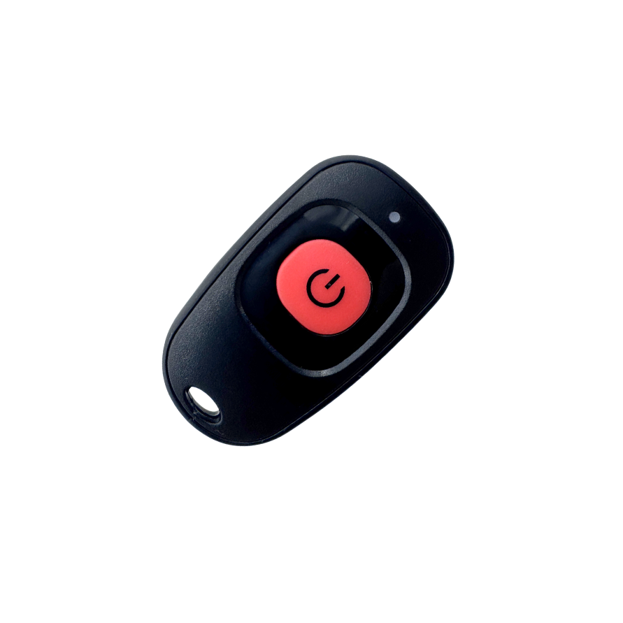 Black remote control with a red button on a white background